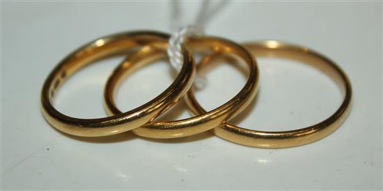 Three 22ct gold wedding bands